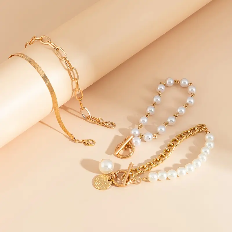 Chic Gold 4-Piece Bracelet Set â€“ Snake, Pearls & Links | Gold - Image 5
