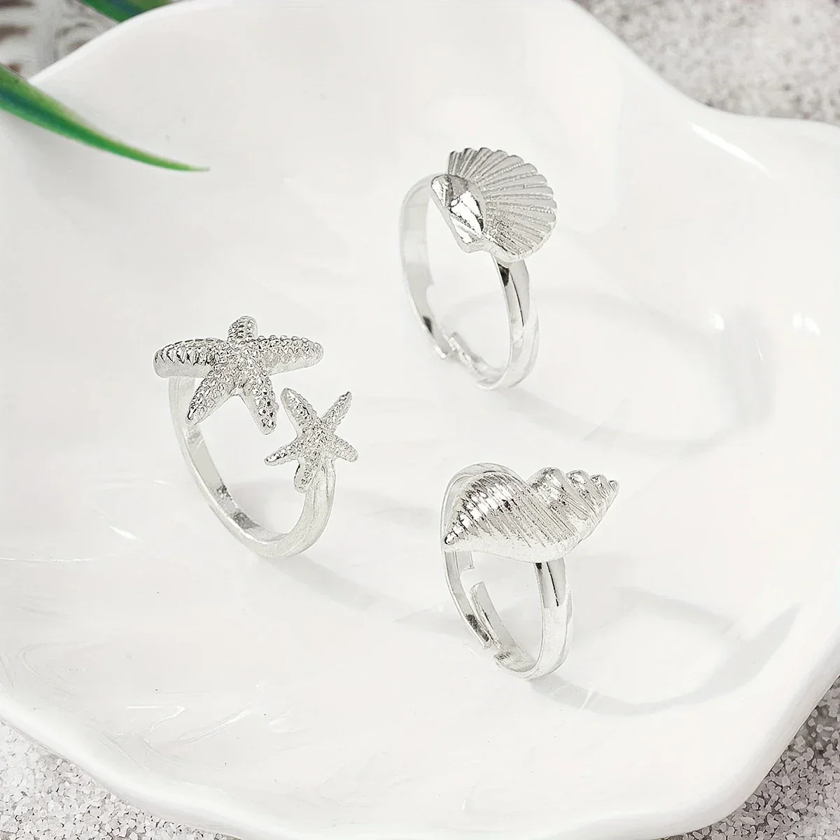 Set of 3 Gold Rings: Shell, Star, and Conch - Image 2