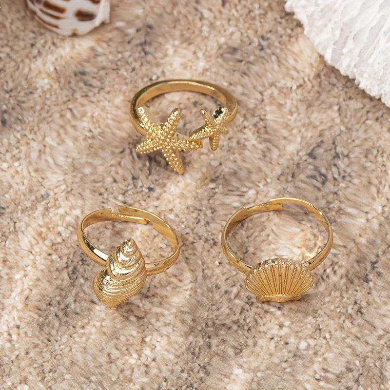 Set of 3 Gold Rings: Shell, Star, and Conch - Image 3